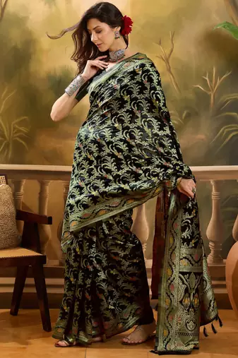 black banarasi jacquard saree with rich zari weaving & tassel pallu     includes unstitched blouse