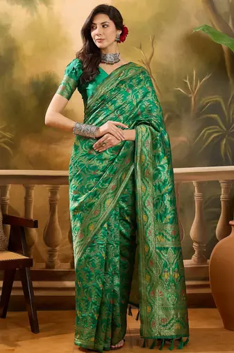 green banarasi jacquard saree with elegant zari weaving & tassel pallu     includes unstitched blouse