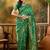 green banarasi jacquard saree with elegant zari weaving & tassel pallu     includes unstitched blouse