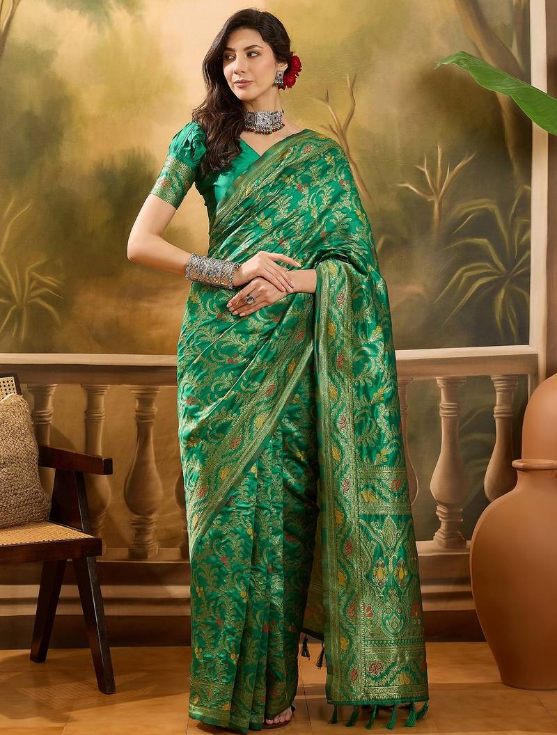 green banarasi jacquard saree with elegant zari weaving & tassel pallu     includes unstitched blouse