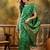 green banarasi jacquard saree with elegant zari weaving & tassel pallu     includes unstitched blouse