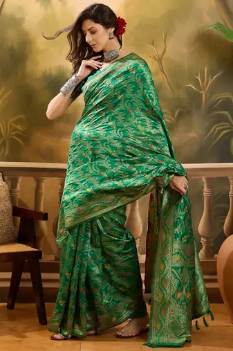 green banarasi jacquard saree with elegant zari weaving & tassel pallu     includes unstitched blouse