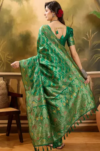 green banarasi jacquard saree with elegant zari weaving & tassel pallu     includes unstitched blouse