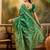 green banarasi jacquard saree with elegant zari weaving & tassel pallu     includes unstitched blouse