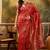 red banarasi jacquard saree with rich zari weaving & tassel pallu     includes unstitched blouse