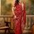 red banarasi jacquard saree with rich zari weaving & tassel pallu     includes unstitched blouse