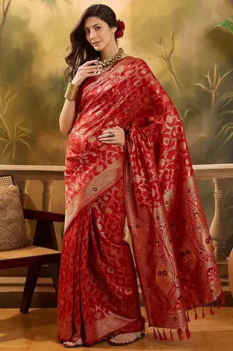 red banarasi jacquard saree with rich zari weaving & tassel pallu     includes unstitched blouse