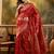 red banarasi jacquard saree with rich zari weaving & tassel pallu     includes unstitched blouse