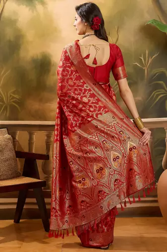 red banarasi jacquard saree with rich zari weaving & tassel pallu     includes unstitched blouse