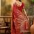red banarasi jacquard saree with rich zari weaving & tassel pallu     includes unstitched blouse