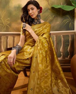 mustard banarasi jacquard saree with rich zari weaving & tassel pallu     unstitched blouse included 2