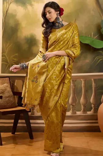 mustard banarasi jacquard saree with rich zari weaving & tassel pallu     unstitched blouse included