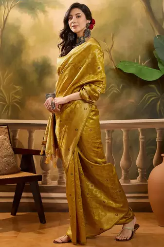 mustard banarasi jacquard saree with rich zari weaving & tassel pallu     unstitched blouse included