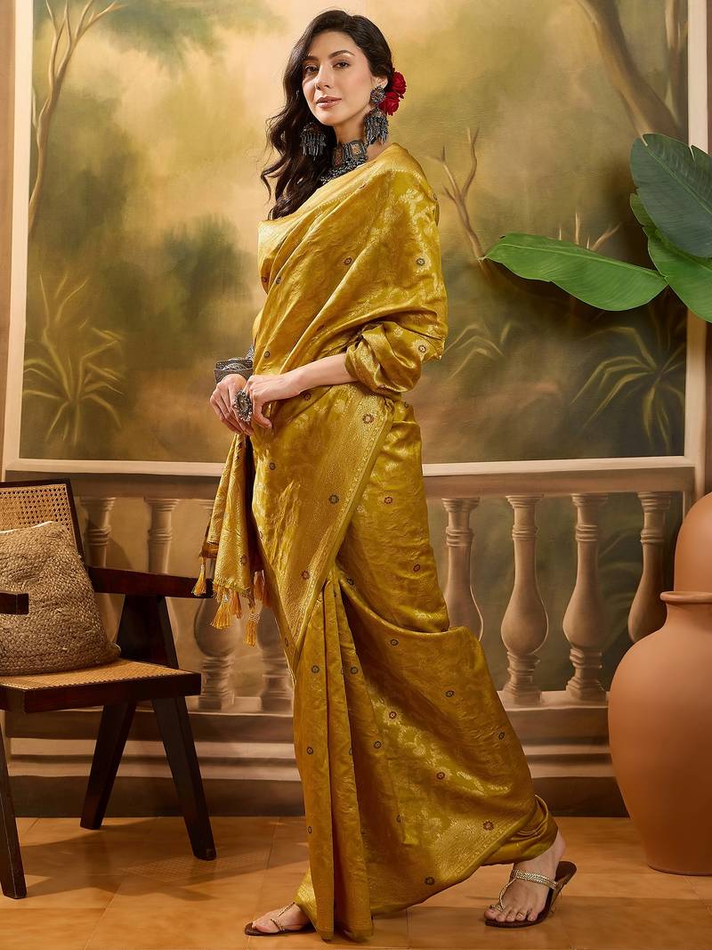 mustard banarasi jacquard saree with rich zari weaving & tassel pallu     unstitched blouse included