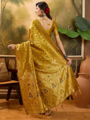 mustard banarasi jacquard saree with rich zari weaving & tassel pallu     unstitched blouse included 5