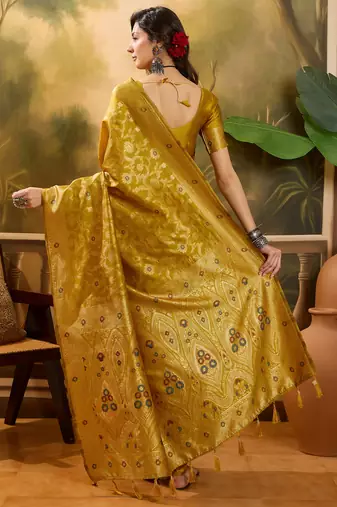 mustard banarasi jacquard saree with rich zari weaving & tassel pallu     unstitched blouse included