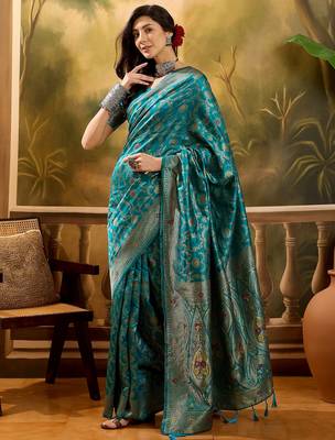 teal blue banarasi jacquard saree with zari weaving & tassel pallu     unstitched blouse included 1