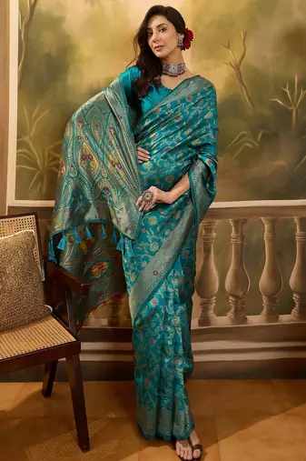 teal blue banarasi jacquard saree with zari weaving & tassel pallu     unstitched blouse included