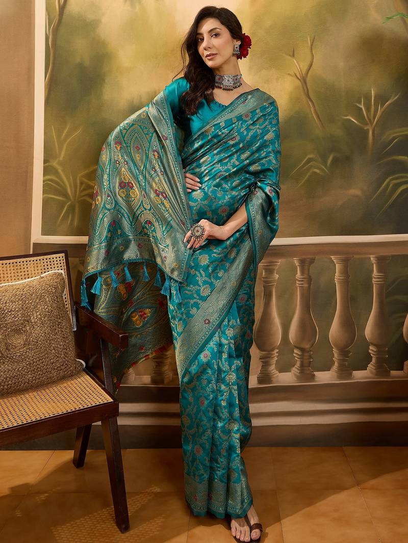 teal blue banarasi jacquard saree with zari weaving & tassel pallu     unstitched blouse included