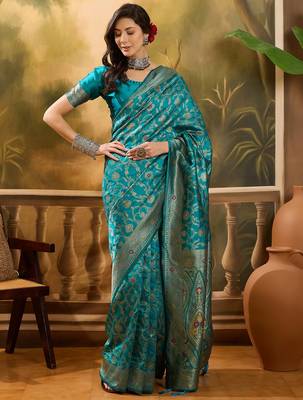teal blue banarasi jacquard saree with zari weaving & tassel pallu     unstitched blouse included 3