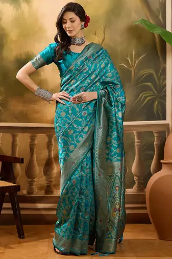 teal blue banarasi jacquard saree with zari weaving & tassel pallu     unstitched blouse included