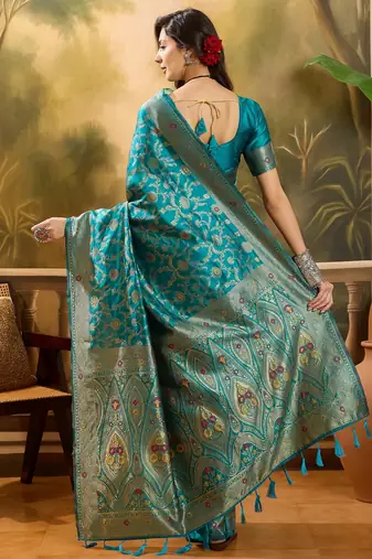 teal blue banarasi jacquard saree with zari weaving & tassel pallu     unstitched blouse included