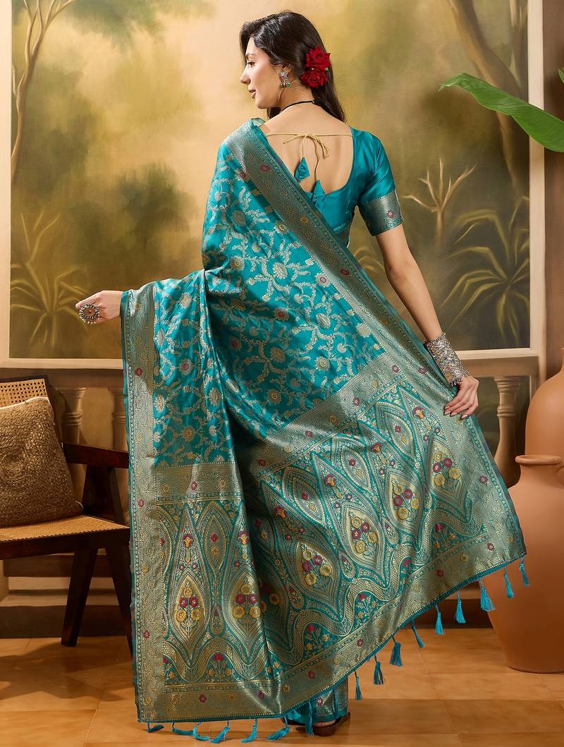 teal blue banarasi jacquard saree with zari weaving & tassel pallu     unstitched blouse included