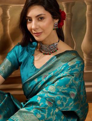teal blue banarasi jacquard saree with zari weaving & tassel pallu     unstitched blouse included 5