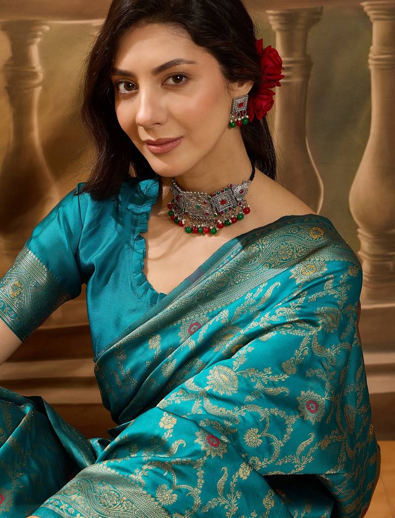 teal blue banarasi jacquard saree with zari weaving & tassel pallu     unstitched blouse included