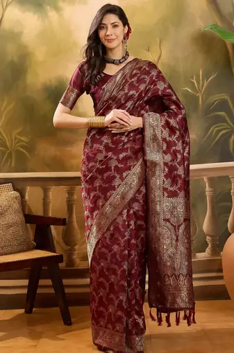 maroon banarasi jacquard saree with zari weaving & tassel pallu     unstitched blouse material