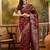 maroon banarasi jacquard saree with zari weaving & tassel pallu     unstitched blouse material