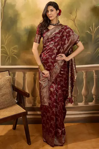 maroon banarasi jacquard saree with zari weaving & tassel pallu     unstitched blouse material