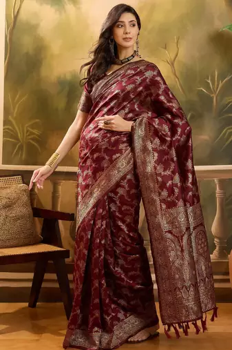 maroon banarasi jacquard saree with zari weaving & tassel pallu     unstitched blouse material