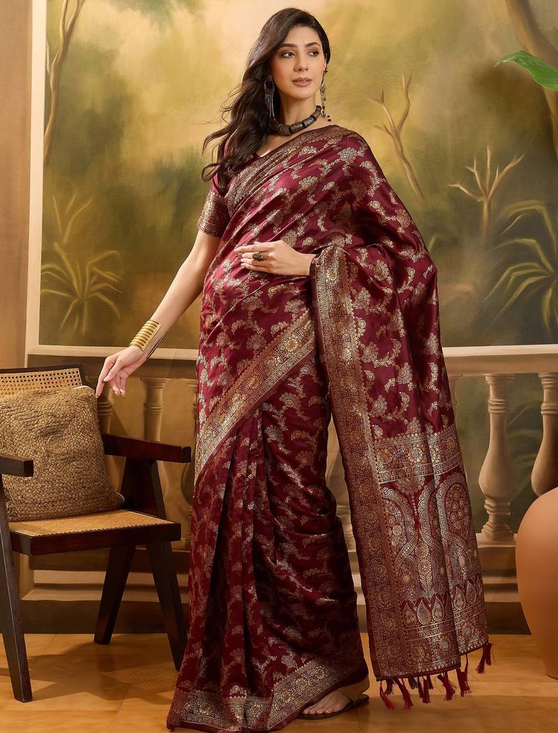 maroon banarasi jacquard saree with zari weaving & tassel pallu     unstitched blouse material