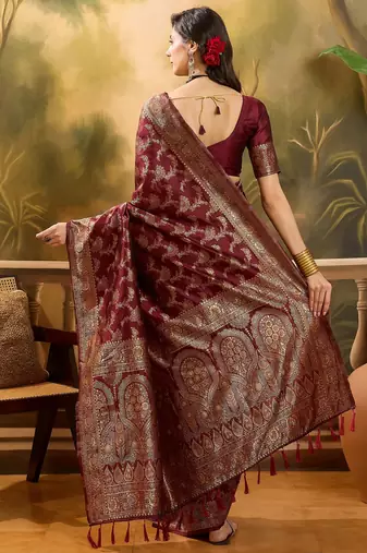 maroon banarasi jacquard saree with zari weaving & tassel pallu     unstitched blouse material