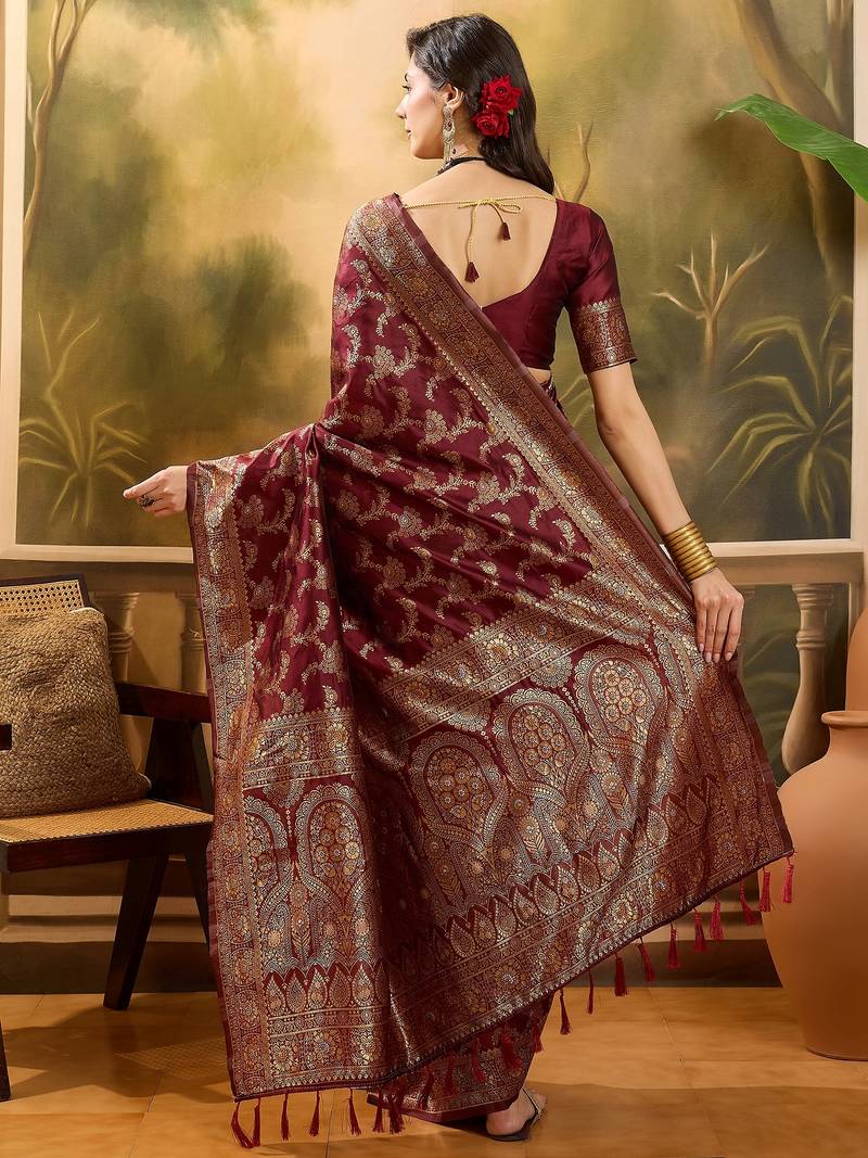 maroon banarasi jacquard saree with zari weaving & tassel pallu     unstitched blouse material
