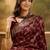 maroon banarasi jacquard saree with zari weaving & tassel pallu     unstitched blouse material