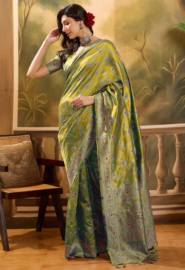 elegant green banarasi jacquard saree with rich zari weaving & tassel pallu     unstitched blouse