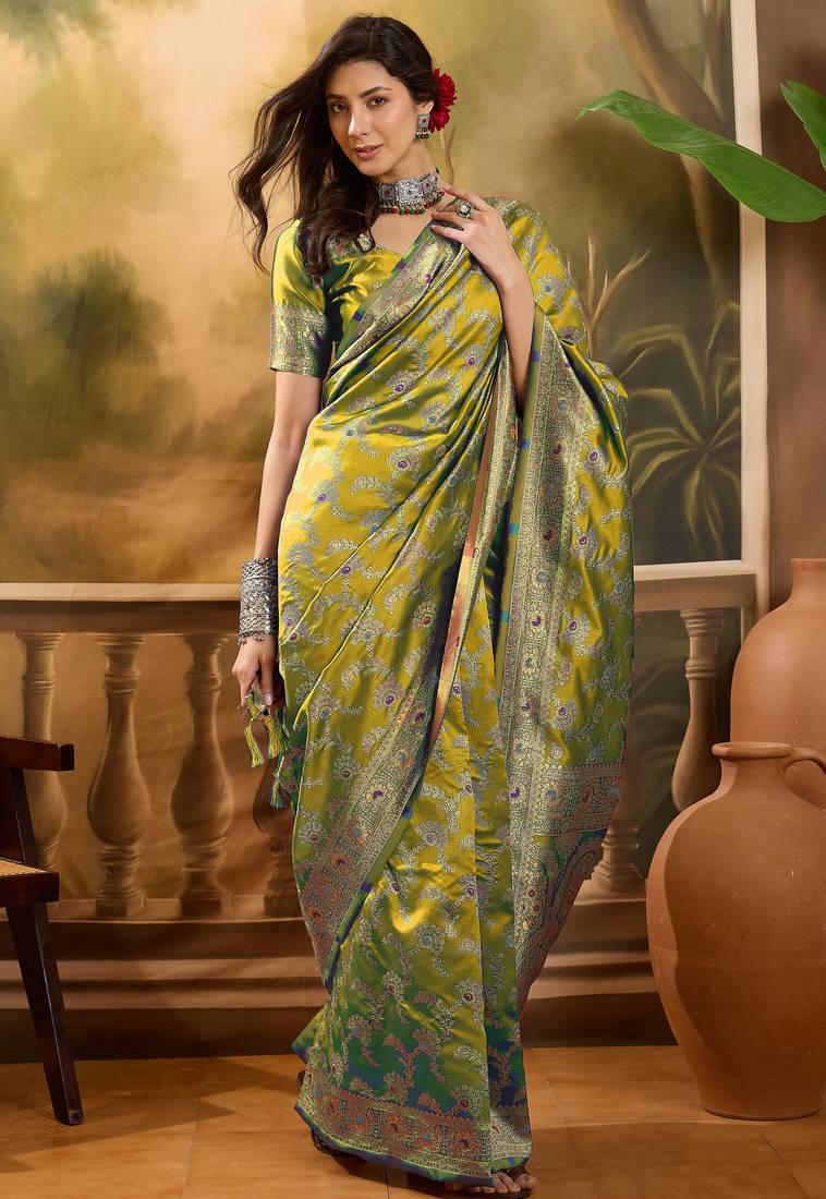 elegant green banarasi jacquard saree with rich zari weaving & tassel pallu     unstitched blouse