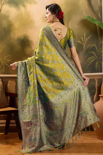 elegant green banarasi jacquard saree with rich zari weaving & tassel pallu     unstitched blouse