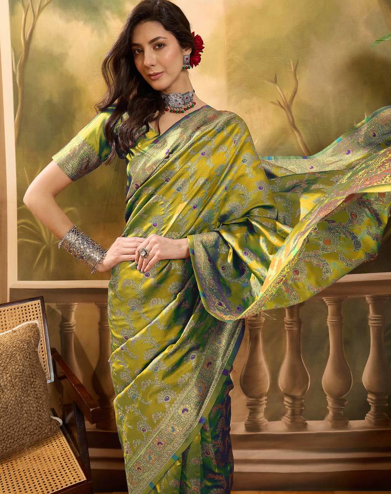 elegant green banarasi jacquard saree with rich zari weaving & tassel pallu     unstitched blouse