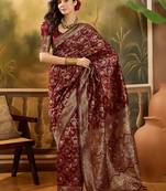 regal maroon banarasi jacquard saree with zari weaving & tassel pallu     unstitched blouse