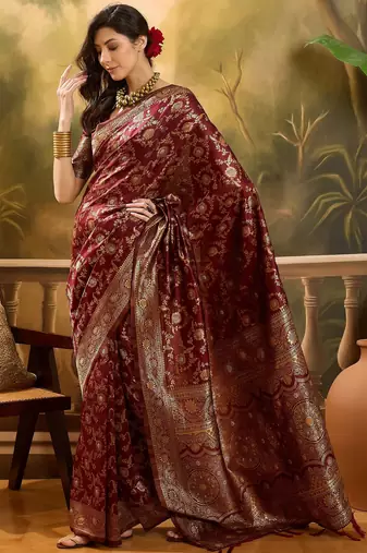 regal maroon banarasi jacquard saree with zari weaving & tassel pallu     unstitched blouse