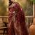 regal maroon banarasi jacquard saree with zari weaving & tassel pallu     unstitched blouse