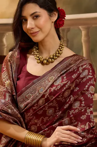 regal maroon banarasi jacquard saree with zari weaving & tassel pallu     unstitched blouse