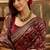 regal maroon banarasi jacquard saree with zari weaving & tassel pallu     unstitched blouse