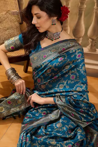 teal blue banarasi jacquard saree with golden zari weaving & tassel pallu     unstitched blouse