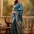 teal blue banarasi jacquard saree with golden zari weaving & tassel pallu     unstitched blouse