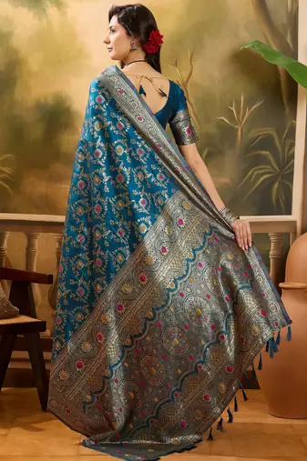 teal blue banarasi jacquard saree with golden zari weaving & tassel pallu     unstitched blouse