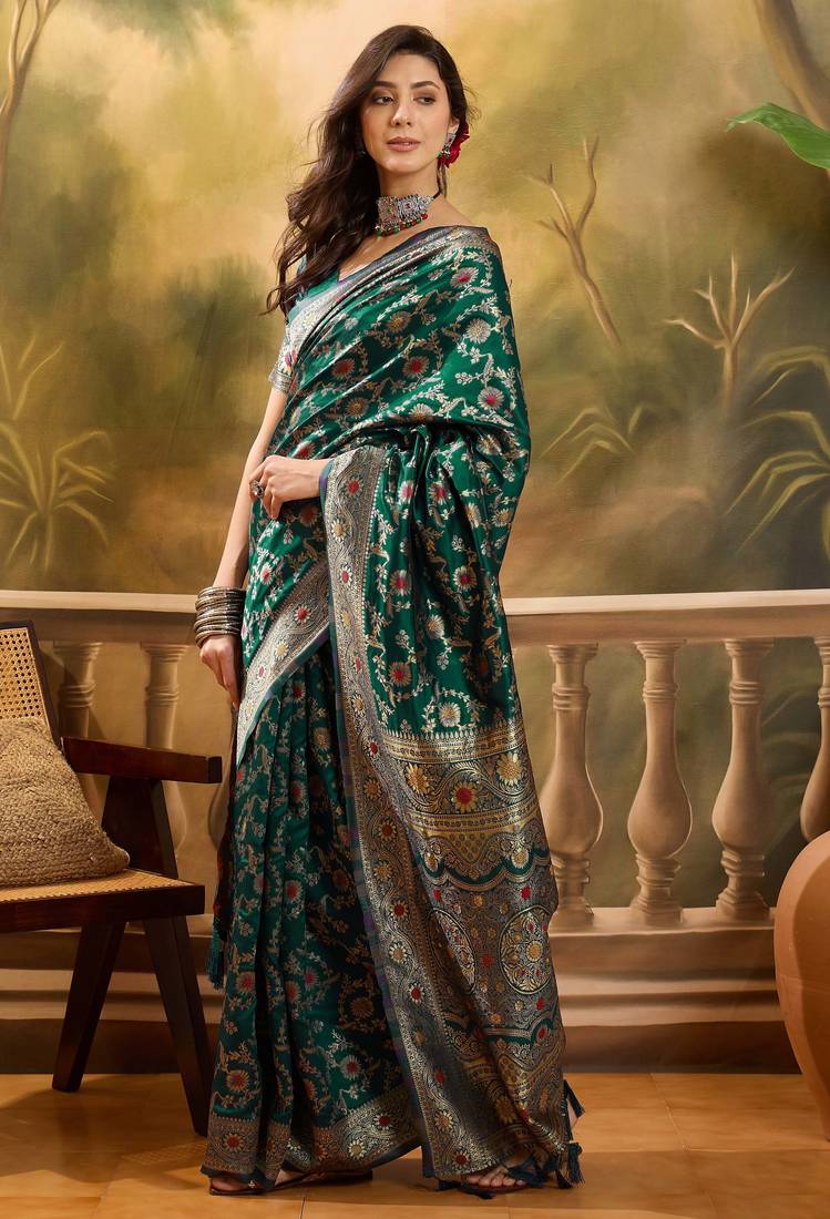 green banarasi jacquard saree with golden zari weaving & tassel pallu     unstitched blouse